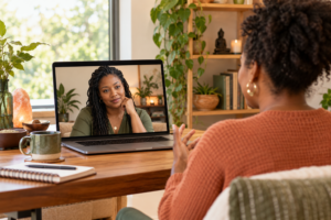 Black woman speaking with a Black naturopathic physician during a culturally responsive virtual wellness consultation